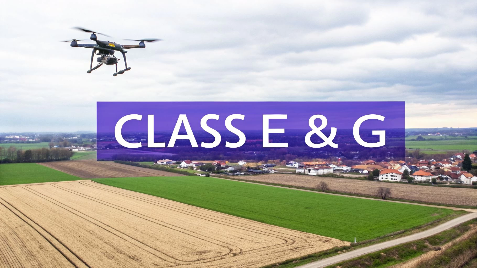 A drone flying over a rural landscape with fields and houses, with a banner displaying 'CLASS E & G'.